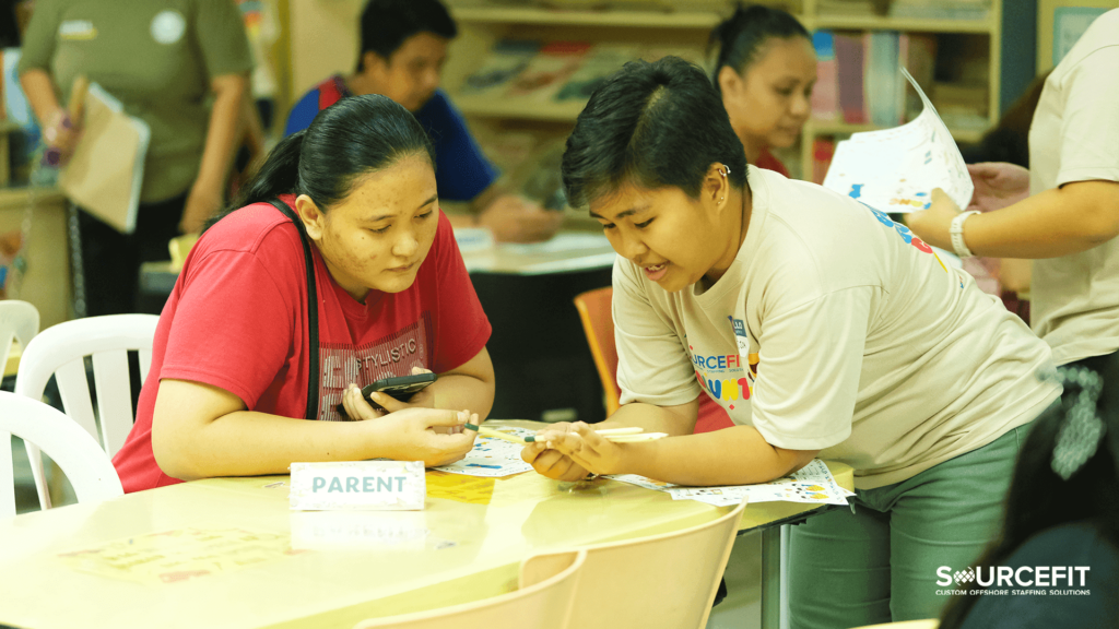 Sourcefit staff and student parent speaking