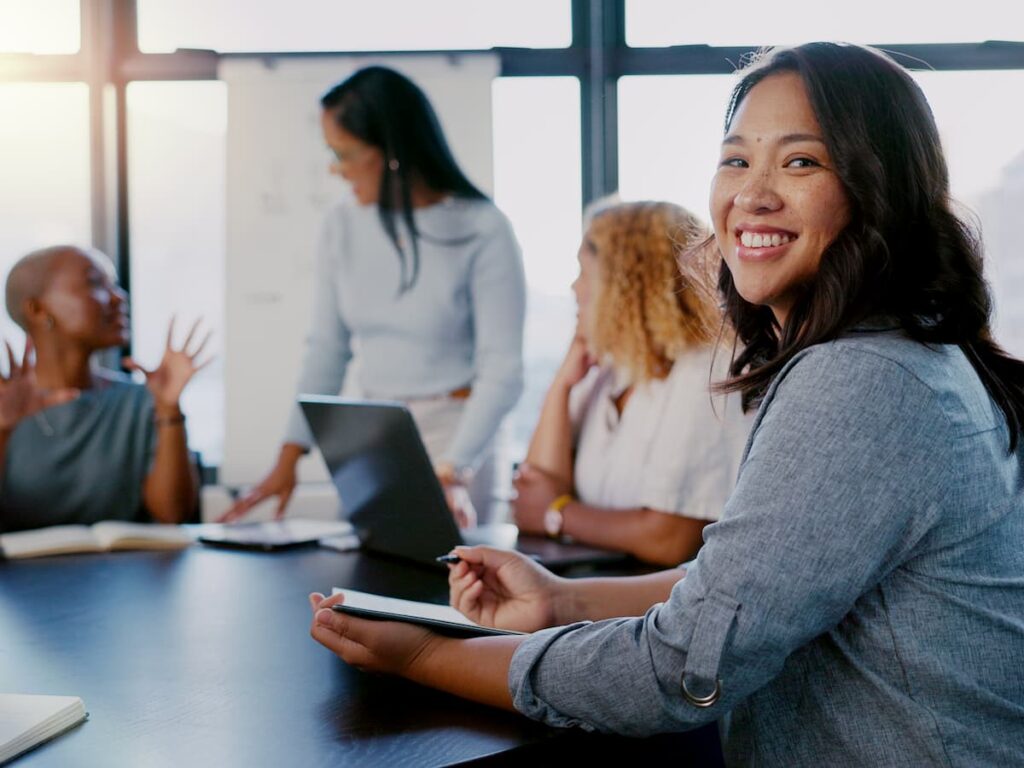 Woman smiling — Top BPO Solutions | Outsourcing Services In The Philippines