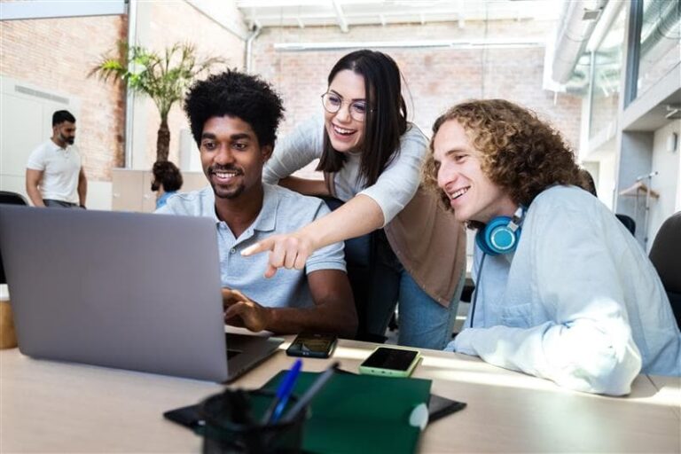 Smiling young multiracial coworkers