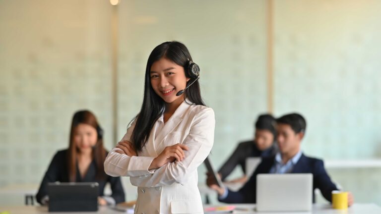 Photo of beautiful woman working as leader — Top BPO Solutions | Outsourcing Services In The Philippines