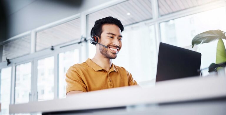 Smiling customer service agent — Top BPO Solutions | Outsourcing Services In The Philippines