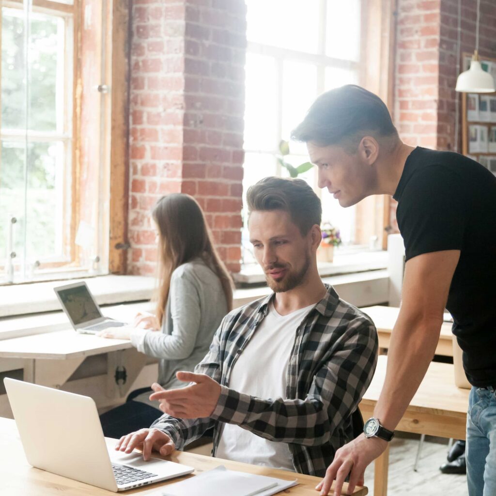 Developers discussing — Top BPO Solutions | Outsourcing Services In The Philippines