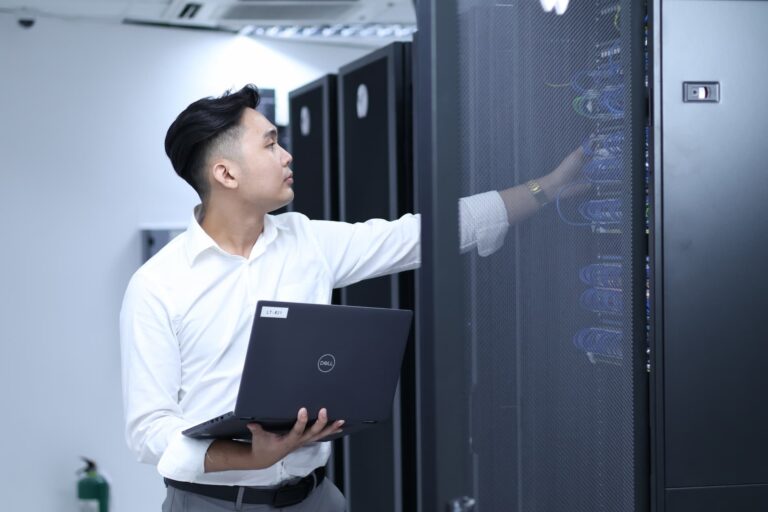 I.T staff working on the server — Top BPO Solutions | Outsourcing Services In The Philippines