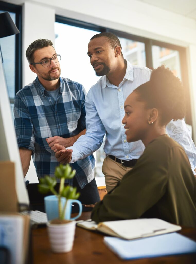 Team members having a meeting — Business process outsourcing & offshore staffing | Sourcefit