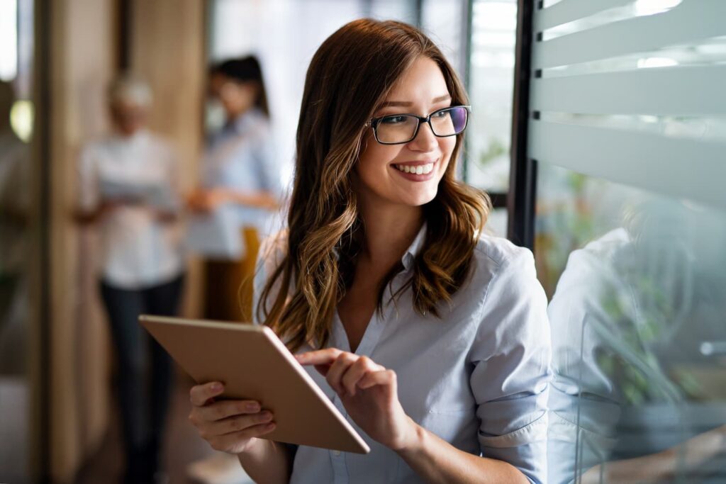 Woman accountant smiling — Business process outsourcing & offshore staffing | Sourcefit