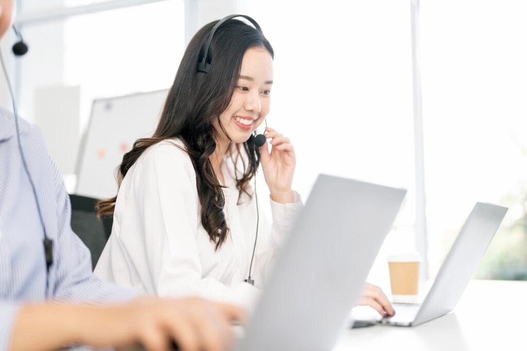 Young asian customer service representative — Business process outsourcing & offshore staffing | Sourcefit