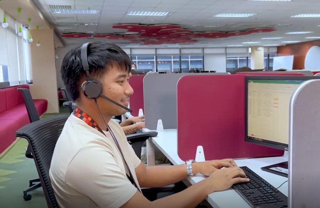 Sourcefit staff smiling — Business process outsourcing & offshore staffing | Sourcefit