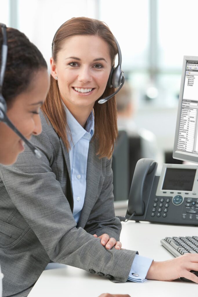 A portal shot of businesswoman smiling — Business process outsourcing & offshore staffing | Sourcefit