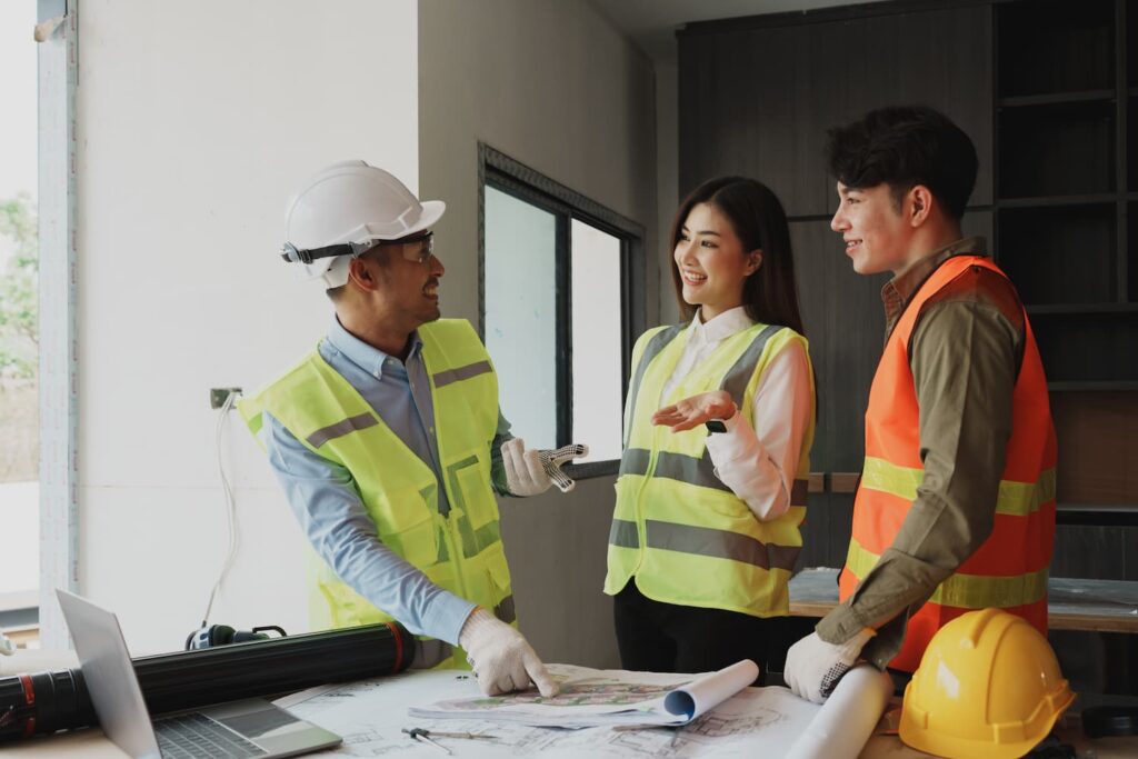 Engineers having a meeting — Business process outsourcing & offshore staffing | Sourcefit