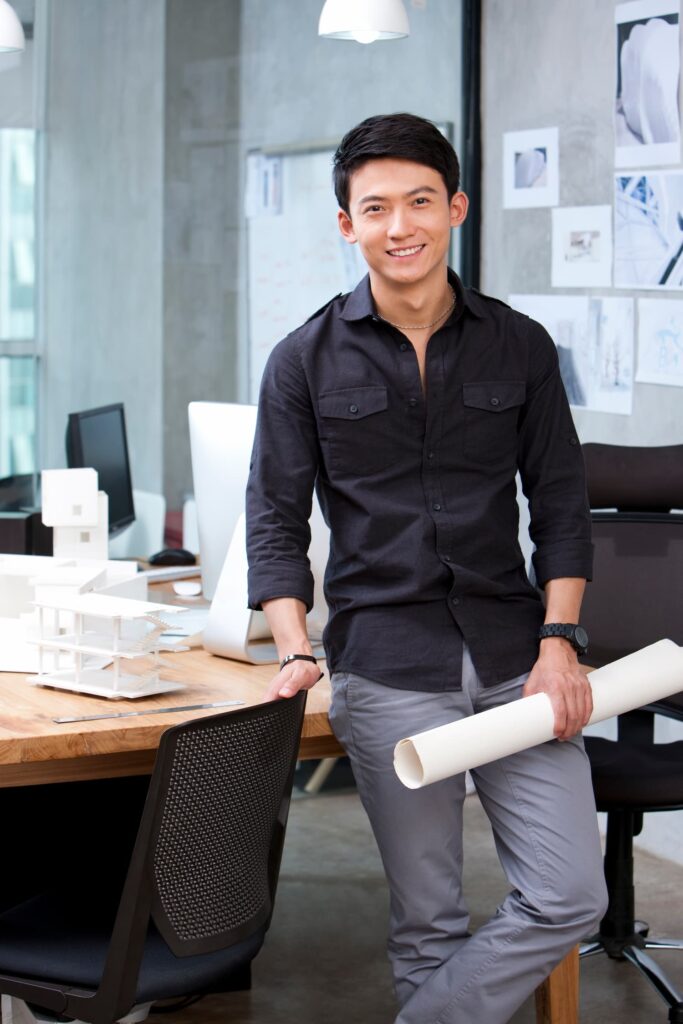 Architect smiling — Business process outsourcing & offshore staffing | Sourcefit