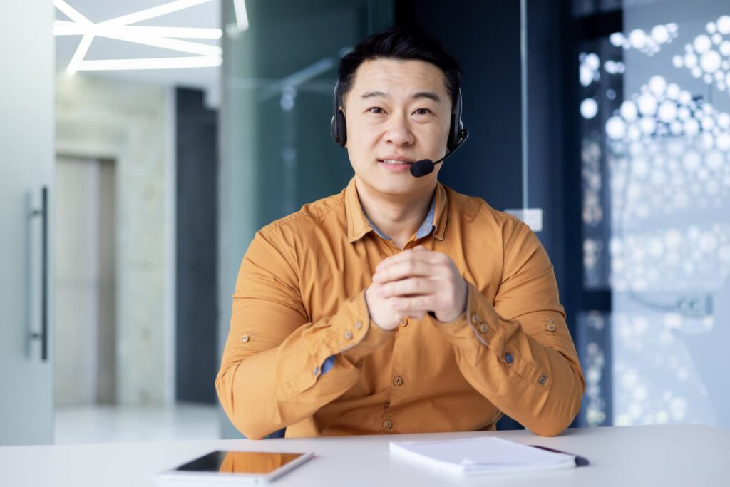 Portrait of a businessman customer support worker — Business process outsourcing & offshore staffing | Sourcefit