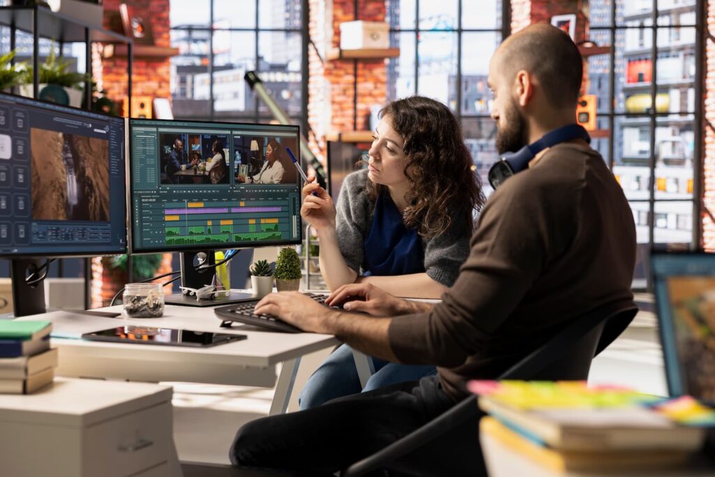 Graphic designers working — Business process outsourcing & offshore staffing | Sourcefit