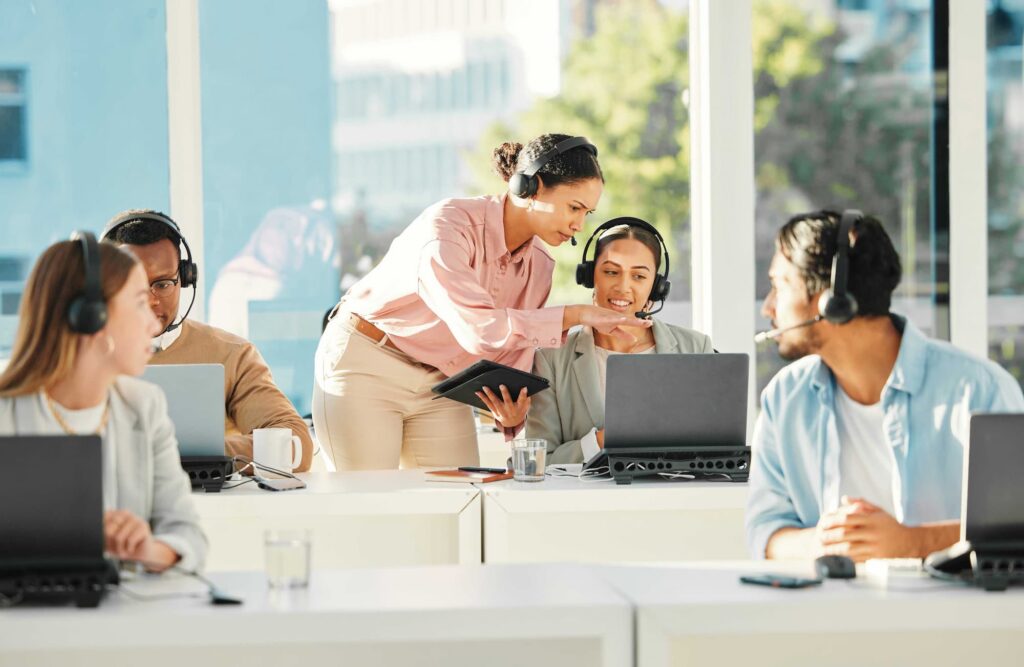 Busy team working on a project — Offshore Staffing & BPO Across 6 Countries