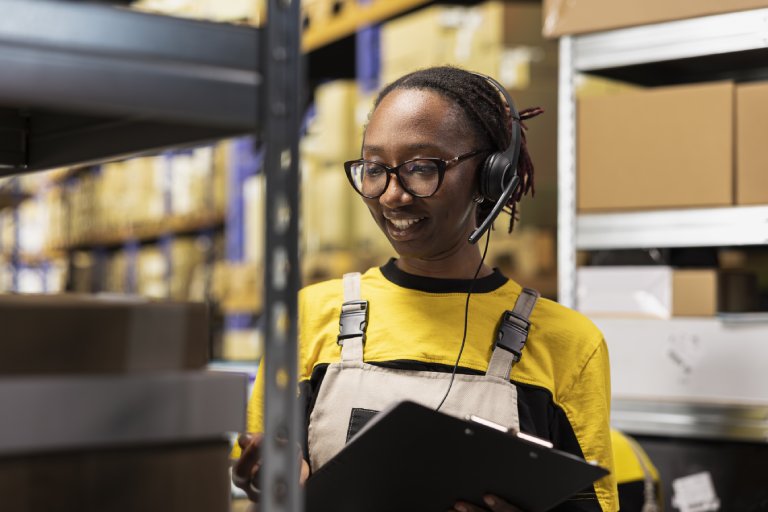 Call center staff member assisting clients in a storehouse depot — Business process outsourcing & offshore staffing | Sourcefit