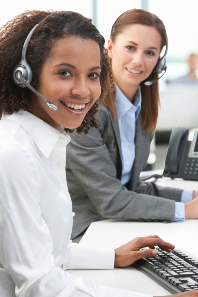 Legal support specialists with headsets: Offshore Staffing & BPO Across 6 Countries