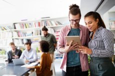 Collaboration and analysis by business people working in office: Learner experience focus: Offshore Staffing & BPO Across 6 Countries