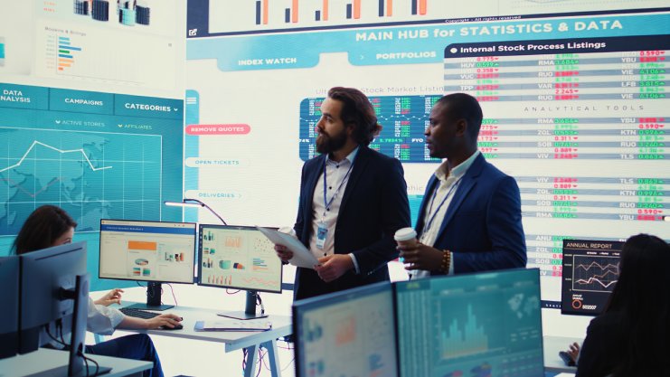 Data analysts reviewing analytics dashboard: Offshore Staffing & BPO Across 6 Countries