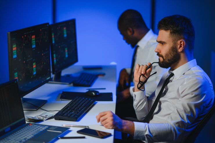Fraud analysts monitoring transaction data: Offshore Staffing & BPO Across 6 Countries