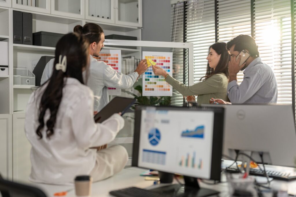 Travel and hospitality team at workstations: Offshore Staffing & BPO Across 6 Countries