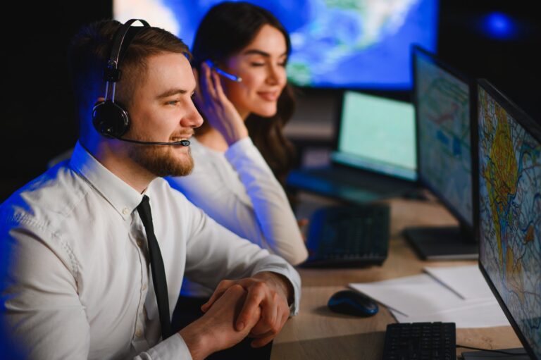 Agents with headsets handling flight claims: Offshore Staffing & BPO Across 6 Countries