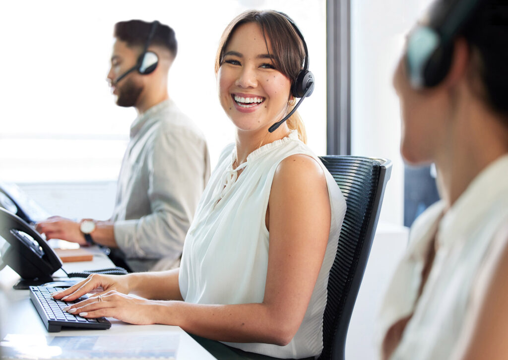 Support agents with headsets working at their desks: Offshore Staffing & BPO Across 6 Countries