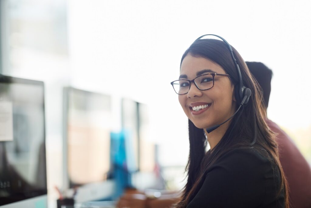 Woman working in a call center: Offshore Staffing & BPO Across 6 Countries