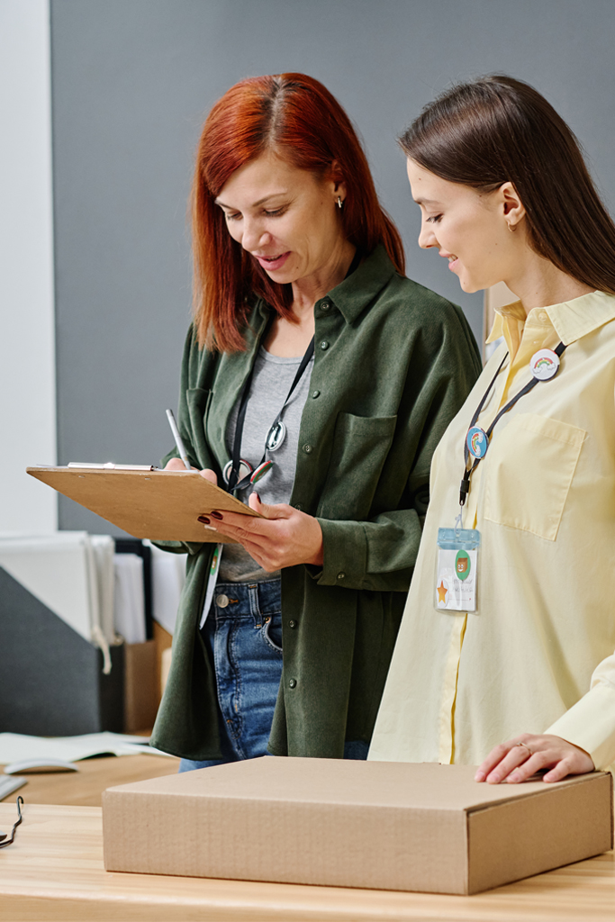 Women collaborating on shipping logistics in an office: Offshore Staffing & BPO Across 6 Countries