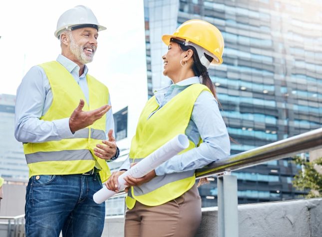 Shot of two business people working together Shot of two business people working together